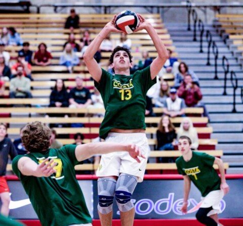 Tread Rosenthal Sets the ball in his NCAA Men's Volleyball Match