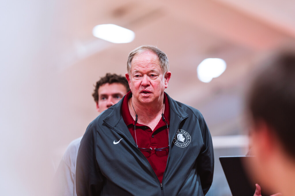 Tom Peterson, Southern Virginia University mens Volleyball Head Coach speaking to his team during a timeout